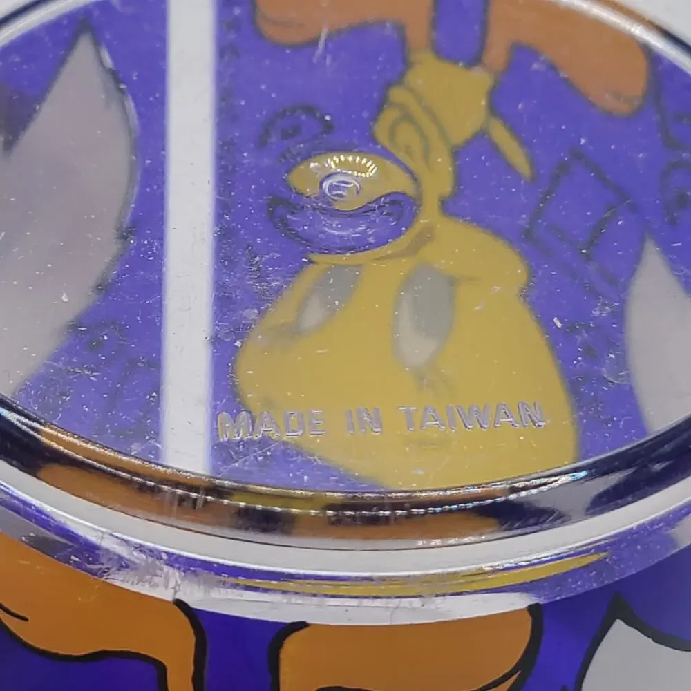 vintage 1994 Warner Brothers clear Plastic. mug featuring the Looney Tunes
